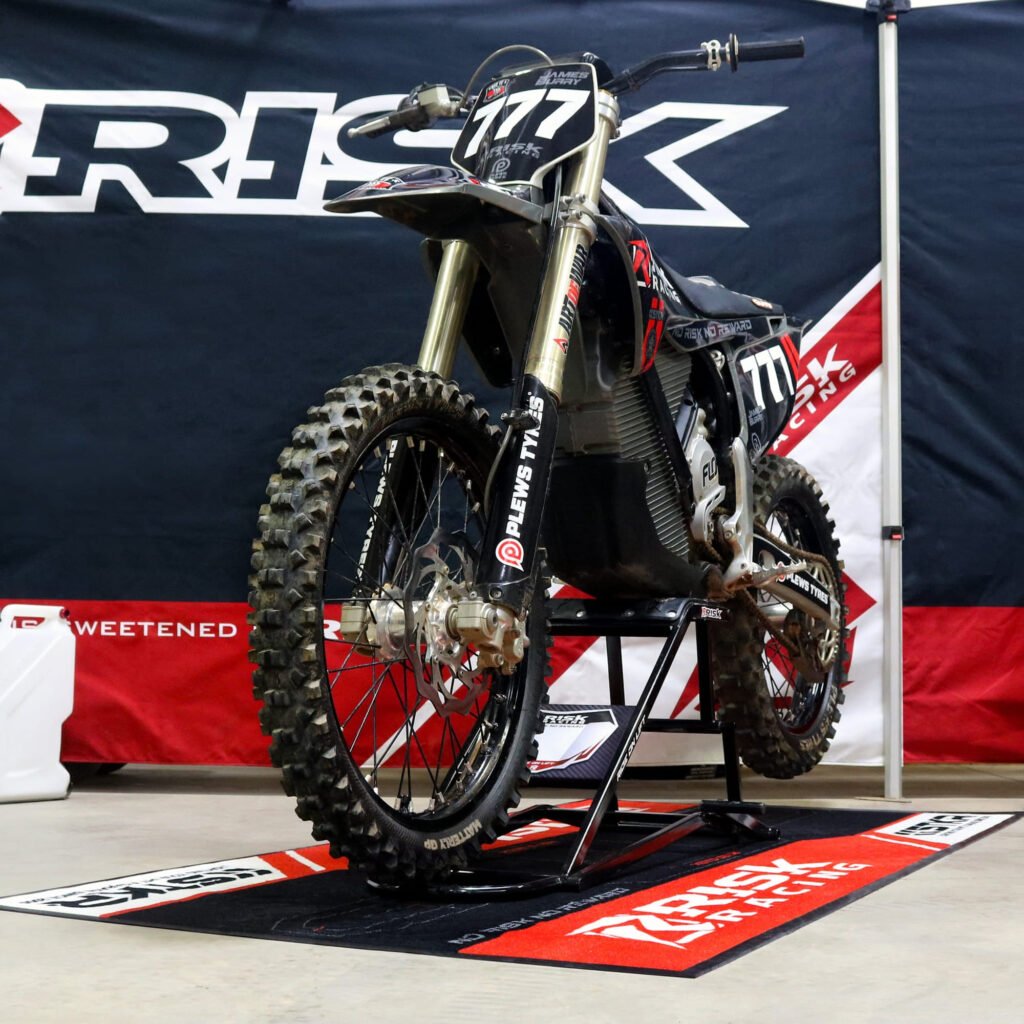 Complete Risk Racing pit setup built around the Carpeted Pit Mat